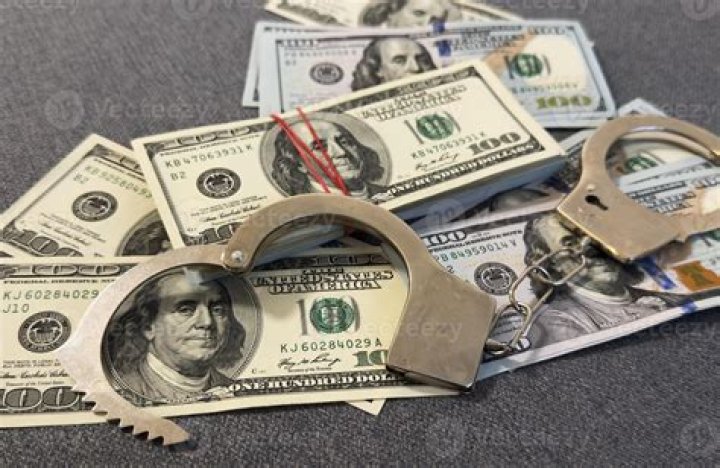 Is defacing money a crime?